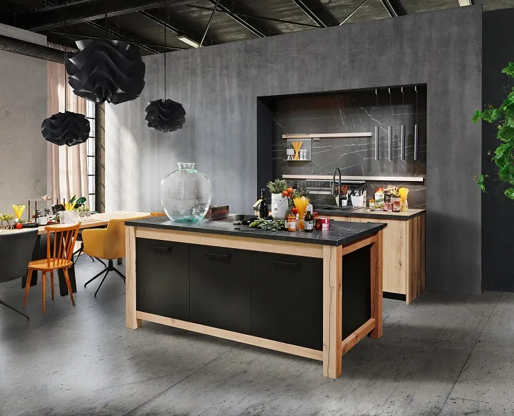 Cuisine style industriel avec îlot central type billot de boucher